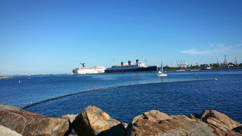 Scenic view of sea against blue sky