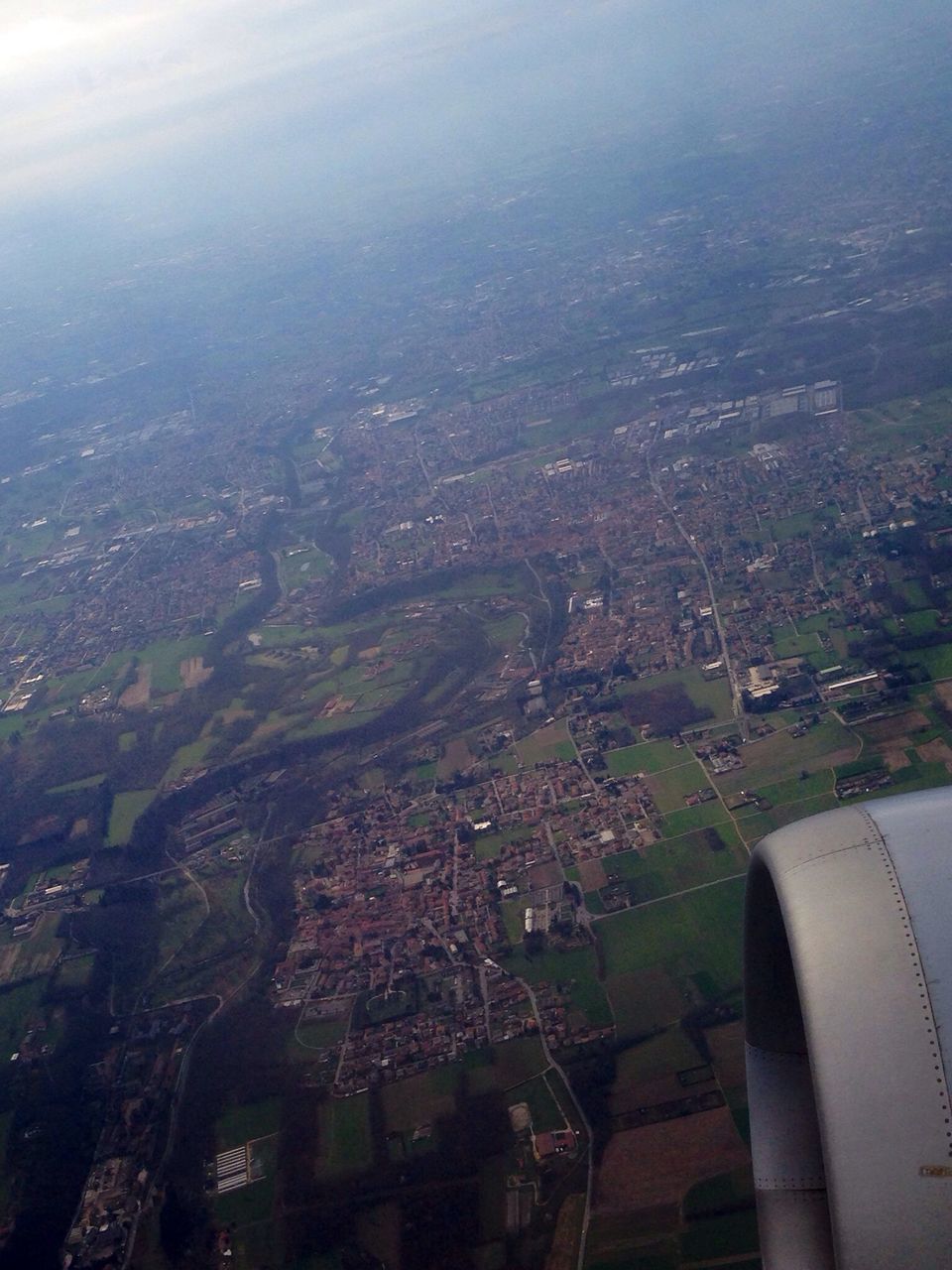 aerial view, high angle view, cityscape, architecture, built structure, city, building exterior, water, transportation, airplane, sky, mode of transport, crowded, day, part of, landscape, sea, nature, cropped, river