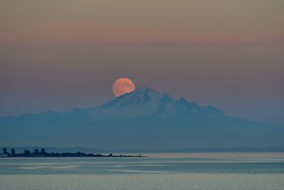 Moon with mountain in foreground