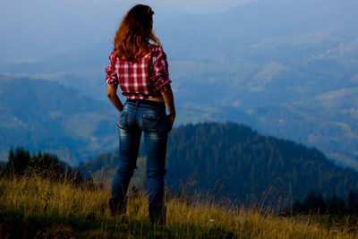 Girl in a red checkered shirt