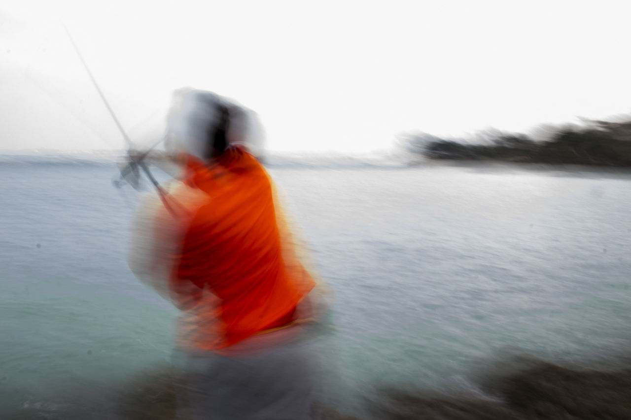 blurred motion, motion, water, one person, sea, nature, sky, day, speed, outdoors, sports, wave, adult, orange color, activity