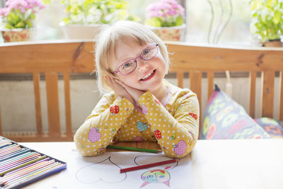 Portrait of girl wearing glasses