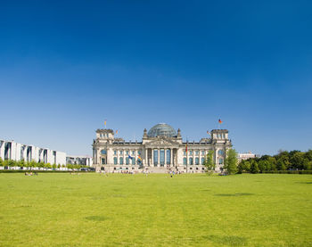 View of palace against clear blue sky