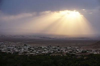 Aerial view of townscape against sky