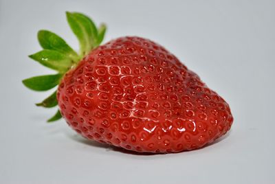 Close-up of strawberries on white background