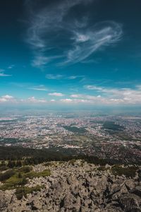 Aerial view of cityscape against sky
