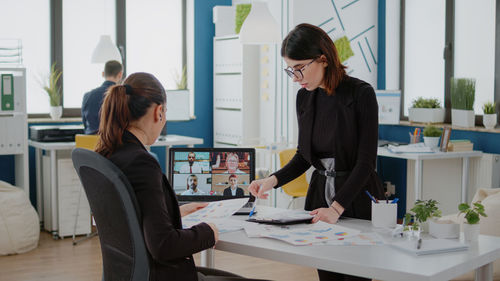 Business colleagues working at office