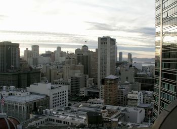 High angle view of buildings in city against sky