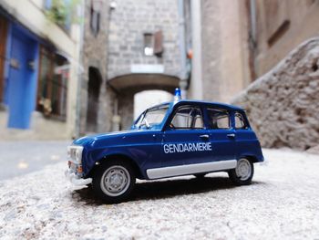 Close-up of vintage car on street
