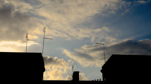 Low angle view of silhouette birds against sky during sunset