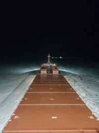 Pier over sea against sky