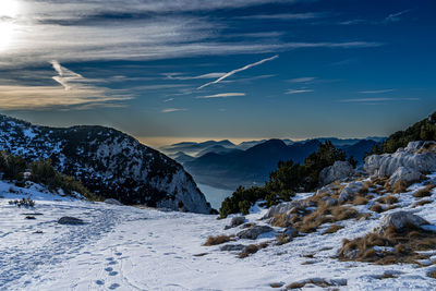 Scenic view of snowcapped mountains against sky