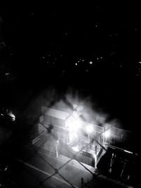 High angle view of illuminated lighting equipment at night