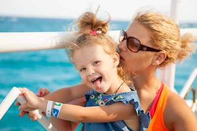 Portrait of happy woman in water