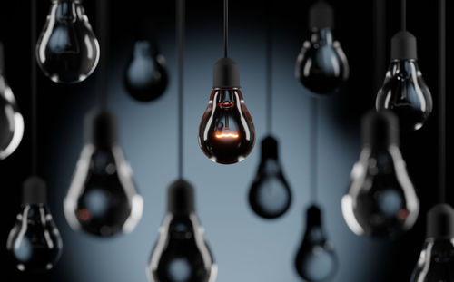 Close-up of illuminated light bulb