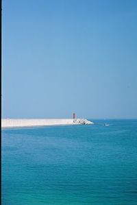 View of calm sea against clear sky