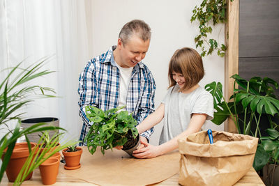 Side view of man working at home