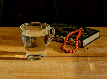 Close-up of beer glass on table