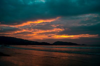 Scenic view of dramatic sky over sea