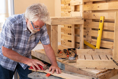 Man working on wood