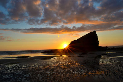 Scenic view of sea at sunset