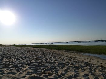 Scenic view of beach against clear sky