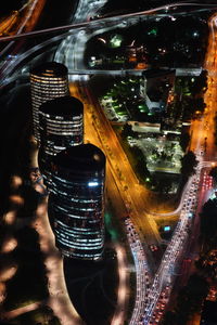 Aerial view of illuminated city at night