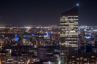 Illuminated tower in the city at night in lyon