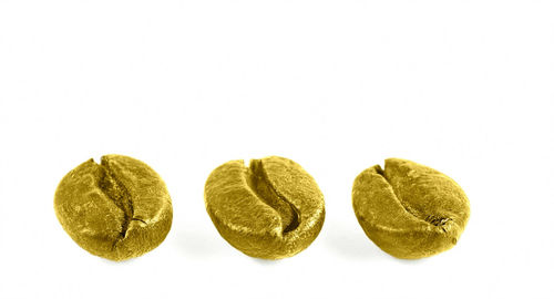 Close-up of fruits against white background