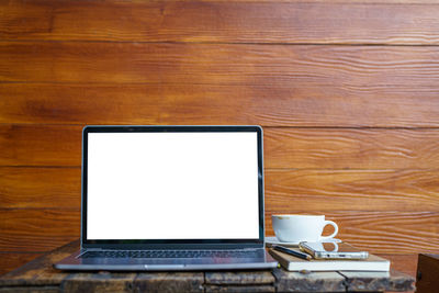 Low angle view of laptop on table