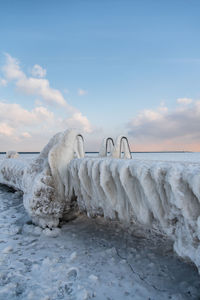 Scenic view of sea against sky during winter