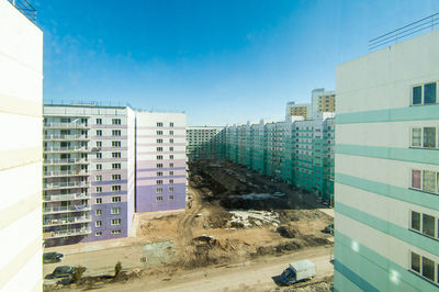 Buildings in city against sky