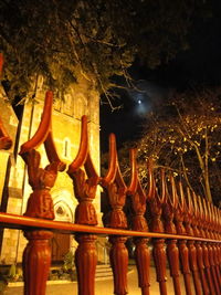 Low angle view of illuminated building at night