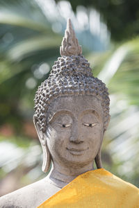 Buddha statue on sunny day