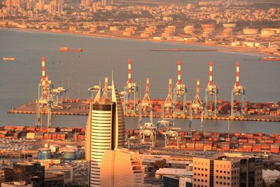 High angle view of cityscape by sea