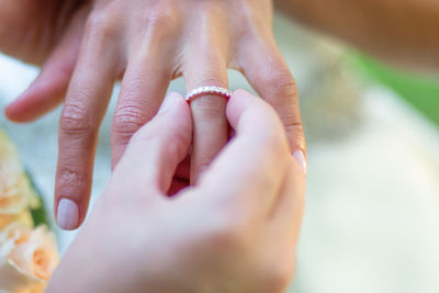 Close-up of couple hands