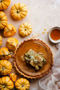 High angle view of pumpkin pie served on table