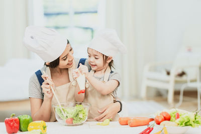 Midsection of woman preparing food