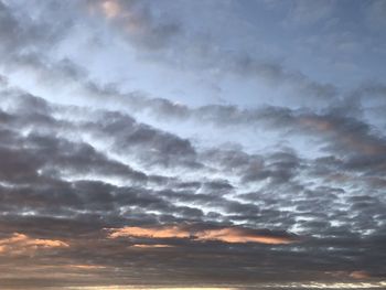 Low angle view of dramatic sky during sunset