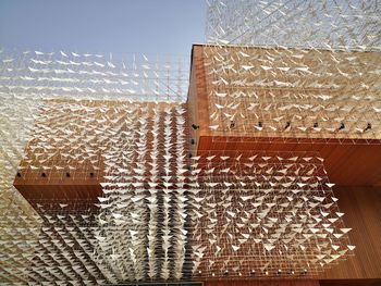 Close-up of wicker basket on wall