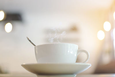 Close-up of coffee in cup on table