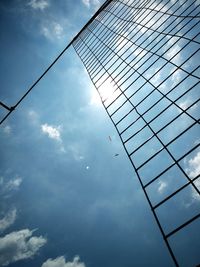 Low angle view of skyscraper against sky