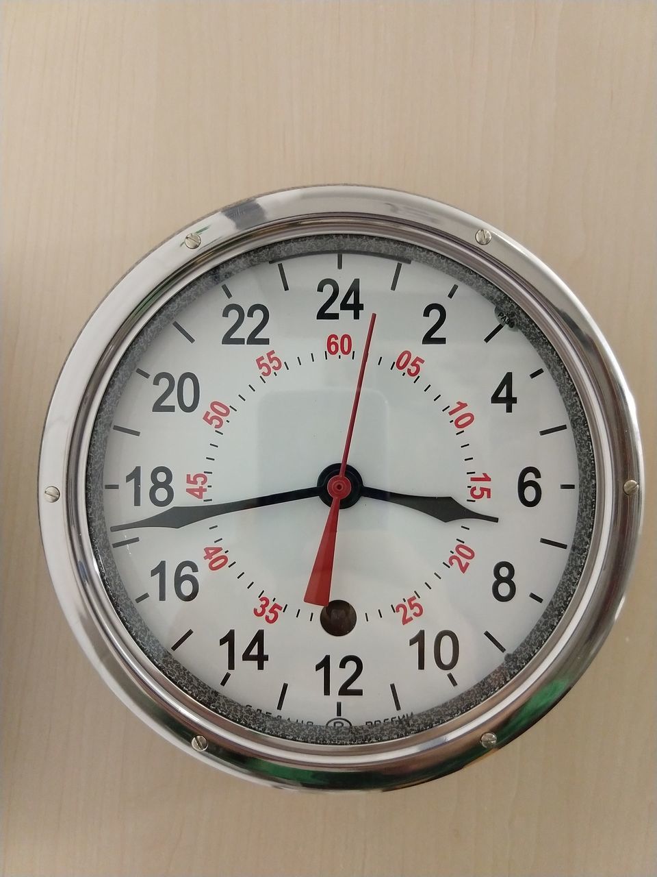 number, time, clock, indoors, wall - building feature, no people, close-up, geometric shape, circle, shape, accuracy, single object, minute hand, instrument of measurement, instrument of time, wall clock, clock hand, table, red, communication, clock face