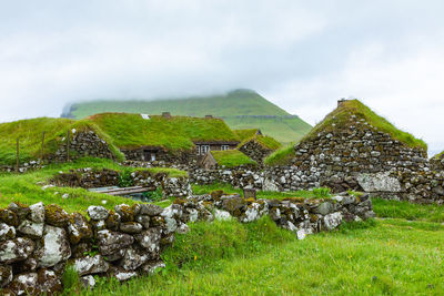 View of old ruin on field