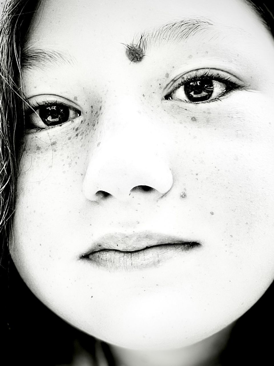 human face, portrait, black and white, one person, white, monochrome photography, close-up, looking at camera, monochrome, human head, headshot, women, portrait photography, young adult, nose, human eye, black, person, eyebrow, front view, adult, skin, female, indoors, child, lip, lifestyles, eyelash, childhood, smiling, studio shot, serious