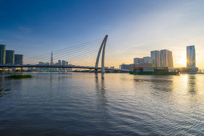 Bridge over river against sky