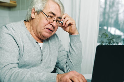 Young man using laptop