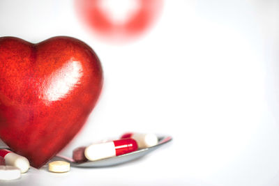 Close-up of pills on white background