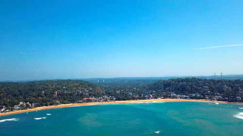 Scenic view of sea against clear sky