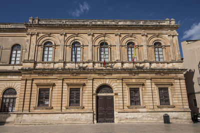 Historic buildings with beautiful facades in piazza duomo in ortigia